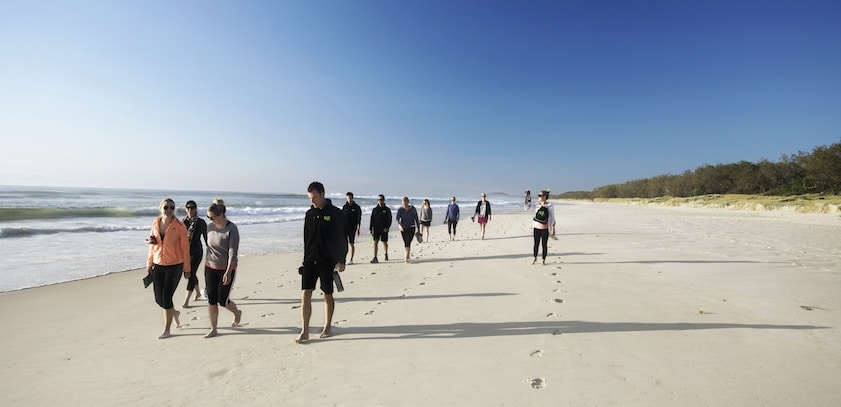 beach walking group shot